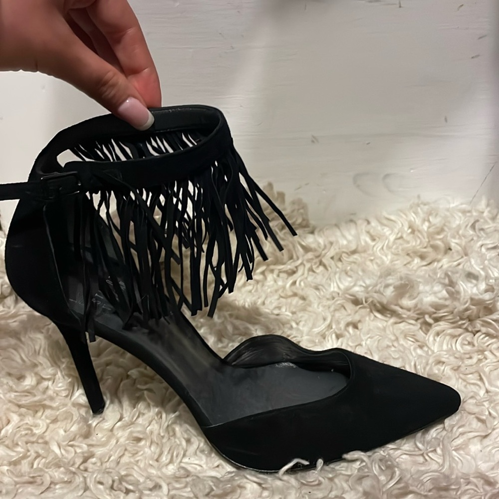 Stuart Weitzman black suede heels with an ankle fringe